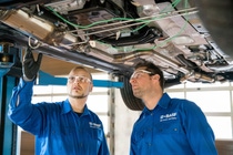 Daniel Schatz, Test Engineer (left) and Alexander Schulz, Technician (right) are setting up a catalyst in the exhaust system of a test vehicle and connect measurement ports. In the Hannover Engine Lab future catalyst technologies are tested on their functionality and durability under real life conditions. Daniel Schatz, Test Engineer (left) and Alexander Schulz, Technician (right) are setting up a catalyst in the exhaust system of a test vehicle and connect measurement ports. In the Hannover Engine Lab future catalyst technologies are tested on their functionality and durability under real life conditions.