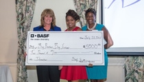 BASF Southfield colleagues Karen Cummins and Tekeyah Duff present a $5,000 donation check to Jeannine Gant, CEO of Big Brothers Big Sisters of Metropolitan Detroit. BASF Southfield colleagues Karen Cummins and Tekeyah Duff present a $5,000 donation check to Jeannine Gant, CEO of Big Brothers Big Sisters of Metropolitan Detroit.