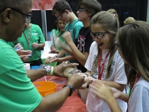 Students enjoy creating chemistry while making slime with BASF employees at Worlds of Opportunity Career Expo. MCINTOSH, AL