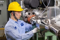 A technician testing an ozone/VOC converter at the new BASF Shanghai MRO Station in Shanghai, China. A technician testing an ozone/VOC converter at the new BASF Shanghai MRO Station in Shanghai, China.