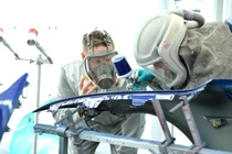 Trainers help the young spray painters to learn more about efficient application processes and provide them with useful tricks for best results with BASF's refinish solutions.