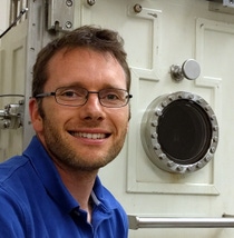 Kevin McPeak, Ph.D with his thermal evaporator, which he will use in the first research project selected for the BASF Sustainable Living Lab.