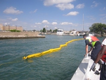 Marine Pollution Control deploys a containment boom as part of BASF Wyandotte’s mock emergency response drill. Marine Pollution Control deploys a containment boom as part of BASF Wyandotte’s mock emergency response drill.