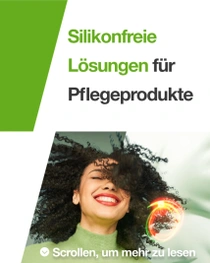 Eine lachende Frau mit schwarzen, lockigen Haaren. Ein Lichtwirbel schwebt über ihrem Haar. Der Text auf dem Bild lautet: „Silikonfreie Lösungen für Pflegeprodukte.“