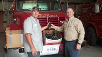 Leon George (left) of Pinehurst Volunteer Fire Department receives donated radios from Jason Gengo (right), Safety Specialist at BASF TOTAL Petrochemicals LLC. The fire department was to one of four area fire departments to receive donated radio equipment. Leon George (left) of Pinehurst Volunteer Fire Department receives donated radios from Jason Gengo (right), Safety Specialist at BASF TOTAL Petrochemicals LLC. The fire department was to one of four area fire departments to receive donated radio equipment.