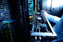 BASF has started up a new supercomputer at its Ludwigshafen site. The new BASF supercomputer, named Quriosity like its predecessor, is the world’s largest supercomputer used in industrial chemical research. Significantly more complex modeling, virtual experiments and simulations are possible with its 3 petaflops computing power (1 petaflops equals one quadrillion floating point operations per second). Quriosity has more than 1,000 compute nodes and 3,000 terabytes of storage capacity. The photo shows a close-up of a compute node of BASF's new supercomputer.