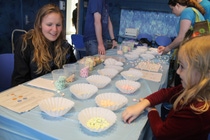 6-year-old Mary Lytle of Plymouth Township creates chemistry by building molecules with marshmallows with BASF volunteers at the Detroit Zoo’s GreenFest. 6-year-old Mary Lytle of Plymouth Township creates chemistry by building molecules with marshmallows with BASF volunteers at the Detroit Zoo’s GreenFest.