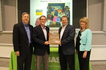 Scott Morris, Sustainability Unit Manager, Honda North America, Inc. (second from left) presents the Honda Corporate Citizenship Award to (left to right) Ted Morris, Business Manager – Asian customers, BASF North America Automotive Coatings Solutions; Chris Toomey, Senior Vice President, BASF Coatings Solutions NA and Karen Cummins, BASF Southfield Site Manager.