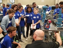 Students participating in BASF’s TECH Academy learn about Process Technology from experienced BASF operator, David Bourgeois.