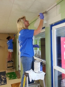 BASF employee volunteers work side-by-side with Educational Center for Independence (ECI) clients to place new tile in a classroom. BASF employee volunteers work side-by-side with Educational Center for Independence (ECI) clients to place new tile in a classroom.