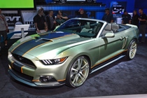 2015 Ford Mustang convertible styled by designer Chip Foose, Glasurit ambassador, features light green metallic paint with orange accents from BASF’s Glasurit® 90-Line, won Ford’s Best in Stand award. 2015 Ford Mustang convertible styled by designer Chip Foose, Glasurit ambassador, features light green metallic paint with orange accents from BASF’s Glasurit® 90-Line, won Ford’s Best in Stand award.