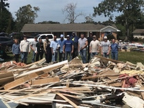 Port Arthur employee Gary Archer and his wife Denise, an employee at the Beaumont site, stand at left with BASF colleagues who helped to remove damaged contents from their flooded home in Lumberton, Texas.