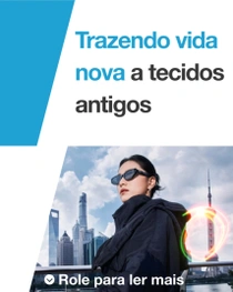 Uma mulher usando uma jaqueta preta casual em frente a uma paisagem urbana de Xangai. Um redemoinho colorido de luz aparece à direita. O texto diz “Trazendo nova vida aos tecidos antigos”