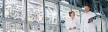 Two BASF researchers, one female and one male, are walking past a research lab full of equipment. Sustainability isn’t a new idea at BASF. Our “Verbund” approach is designed to connect people, systems and production plants to reduce waste, cut transport, maximise energy efficiency and transfer expert knowledge.