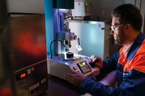 With B2Last®, BASF has developed an innovative bitumen additive that combines both asphalt performance and sustainability: Temperature-reduced paving with a high recycled asphalt content is made possible through the use of B2Last®, while guaranteeing consistent workability. This creates significantly lower bitumen and CO2 emissions compared to standard applications, while the asphalt resistance is also increased, thereby extending the life span of the road. Waldemar Schatz from the B2Last technical service carries out a needle penetration test to determine the hardness of a bitumen sample. With B2Last®, BASF has developed an innovative bitumen additive that combines both asphalt performance and sustainability: Temperature-reduced paving with a high recycled asphalt content is made possible through the use of B2Last®, while guaranteeing consistent workability. This creates significantly lower bitumen and CO2 emissions compared to standard applications, while the asphalt resistance is also increased, thereby extending the life span of the road. Waldemar Schatz from the B2Last technical service carries out a needle penetration test to determine the hardness of a bitumen sample.