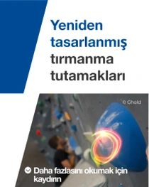 Bir tırmanma salonunda bulanık arka planda bir kişiyle kırmızı-yeşil ışık girdabı efektli tırmanma duvarında mavi tırmanma tutamağının yakın çekimi. Metin: "Yeniden tasarlanmış tırmanma tutamakları" Bir tırmanma salonunda bulanık arka planda bir kişiyle kırmızı-yeşil ışık girdabı efektli tırmanma duvarında mavi tırmanma tutamağının yakın çekimi. Metin: "Yeniden tasarlanmış tırmanma tutamakları"