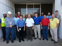 BASF employees collected five bins full of electronic recycling goods to contribute to United Cerebral Palsy of Mobile. First row from left to right: Bill Napper, Group Leader – Analyzer and Intermediate Testing, George Vann, Vice President of BASF McIntosh, Todd Perkins, UCP Vice President of Programs, Marty Wheeler, UCP Vice President of Administrative Services, Ramon Hoffman, UCP Recyclables Processor and Eric Cash, UCP Special Events Coordinator. Second row left to right: Sean Radcliff, Kellogg Brown & Root, Maurice Ware, Environmental, Health and Safety Team Leader, James Shore, Culture Transformation and Knowledge Management Coordinator, Susan Tomlinson, Environmental, Health and Safety Specialist, Cathy Boyett, Sustainability Coordinator – Light Stabilizer Production Unit, Wiley Schell, Project Engineer, Bill Wiggins, Chemist – Technical Services, Sam Davidson, Light Stabilizer Production Unit Operator and James Singleton, Maintenance Project Engineering Specialist.
