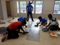 BASF employee volunteers paint all of the walls in a classroom used by clients of the Educational Center for Independence (ECI). BASF employee volunteers paint all of the walls in a classroom used by clients of the Educational Center for Independence (ECI).