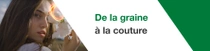 Une femme aux longs cheveux bruns tient une plante de coton près de son visage. Un tourbillon lumineux est visible au-dessus de la plante de coton. Le texte indique « De la graine à la couture ». 