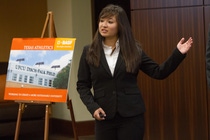 Winning team member Teresa Wu, chemical engineering major at University of Texas (UT) Austin, presents the "Array of Sunshine" to the BASF Team Chemistry Sustainability Challenge judges.