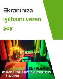 Luminous BASF products under UV light in green and orange colors with a light swirl. The text reads: "What makes your screen shine". Luminous BASF products under UV light in green and orange colors with a light swirl. The text reads: "What makes your screen shine".