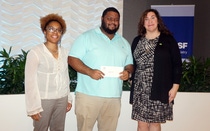 Pictured from left to right, Sjocquelyn R. Winstead, Vice Principal K-4; Darrell Williams, 7th Grade Math Teacher; Molly Borst, Manager of Science Education, North America, for BASF.