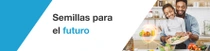 Un hombre y una niña están de pie en una cocina, preparando verduras frescas juntos. Una espiral de luz revolotea por la encimera. En el texto pone: “Semillas para el futuro”.